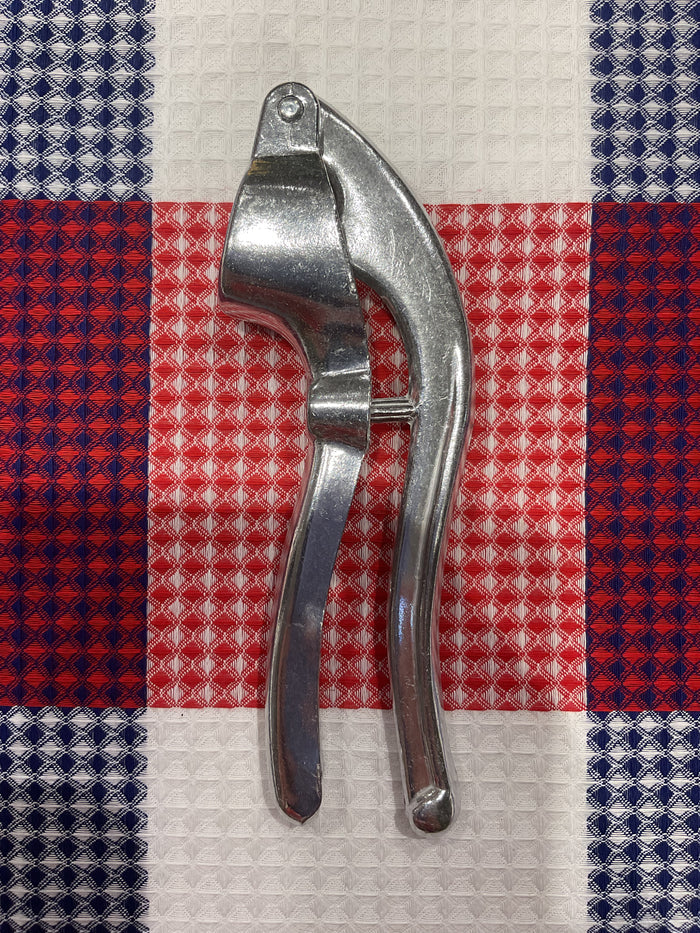 Roger Orfèvre 2-in-1 garlic crusher and olive/cherry pitter