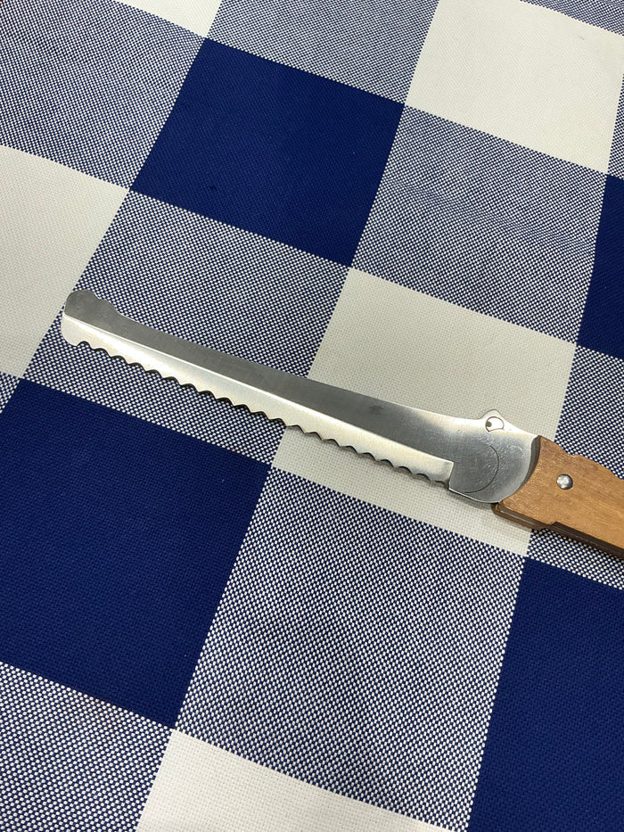 Roger Orfèvre Croco(dile) bread knife with olive wood handle