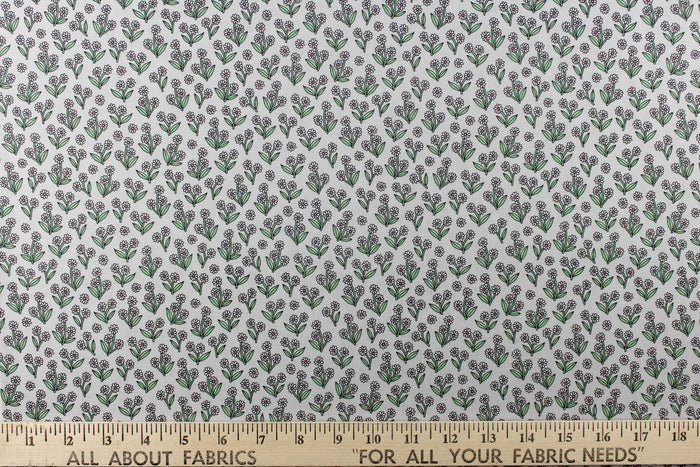 A beautiful white daisy design set against a light gray background.