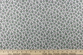 A beautiful white daisy design set against a light gray background.