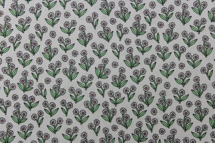 A beautiful white daisy design set against a light gray background.