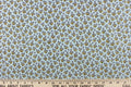 A beautiful white daisy design set against a pale blue gray background.