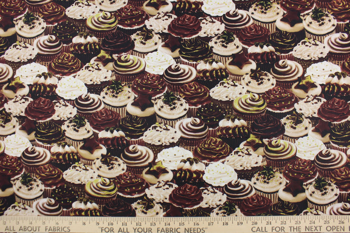 Celebrate your favorite sweet treat with this cute print of cupcakes from the "Chocolicious" collection.  The versatile lightweight fabric is soft and easy to sew.  It would be great for quilting, crafting and sewing projects.  Colors include shades of brown, cream and lime green.