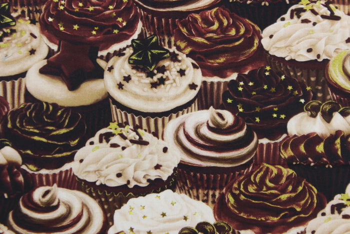 Celebrate your favorite sweet treat with this cute print of cupcakes from the "Chocolicious" collection.  The versatile lightweight fabric is soft and easy to sew.  It would be great for quilting, crafting and sewing projects.  Colors include shades of brown, cream and lime green.