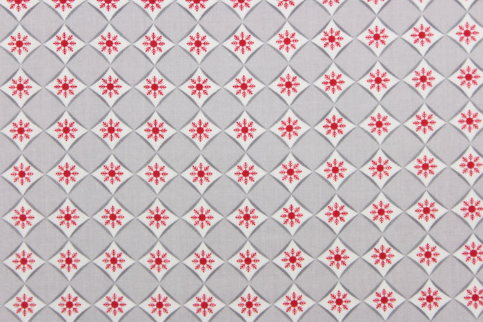 This is a cute and simple print of diamonds and snowflakes.  The versatile lightweight fabric is soft and easy to sew.  It would be great for quilting, crafting and sewing projects.  Colors include red, grey and white.