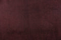 This duotone hard wearing, textured chenille fabric in burgundy with black accents would be a beautiful accent to your home decor.