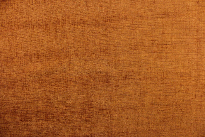 This hard wearing, textured chenille fabric in apricot would be a beautiful accent to your home decor