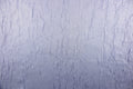 This taffeta fabric features a crinkle in iridescent silver blue color.