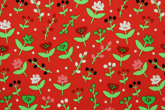 This cotton print fabric features dainty flowers in the colors of red, pink, green and white on a red background.  It has a nice soft hand and would be great for quilting, crafting and home décor.