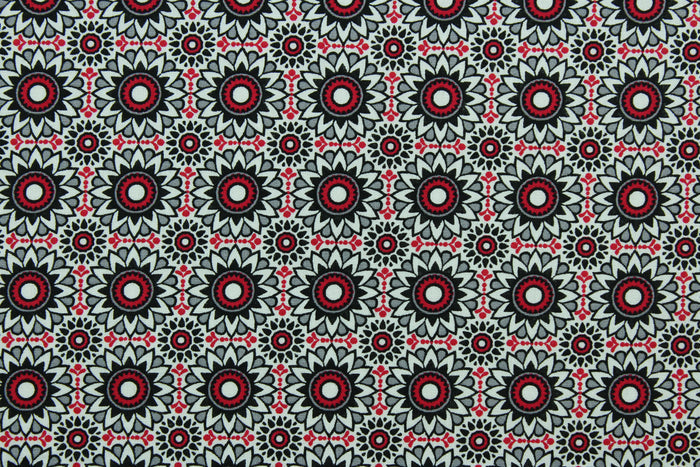This fabric features a kaleidoscope of flowers in red, white, black, and gray.  This lightweight fabric is easy to sew and has a soft hand.   The versatile fabric makes it great for quilting, crafting and home décor.
