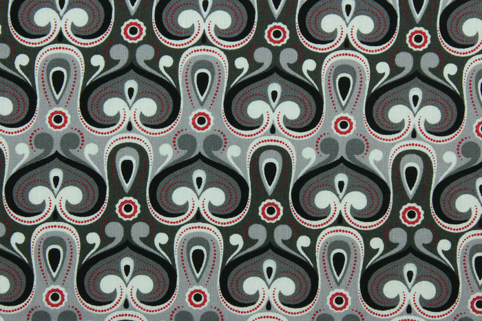 This fabric features an abstract design in red, gray, black and white.  The lightweight fabric is easy to sew and has a soft hand.  The versatile fabric makes it great for quilting, crafting and home décor.