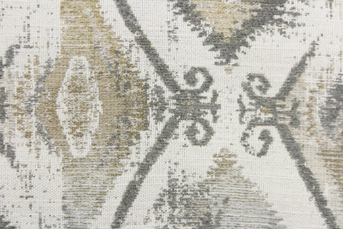 This jacquard features a diamond design in varying shades of gray and taupe .