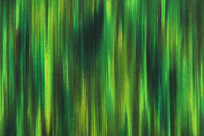 This fabric features stripes in varying shades of green with hints of black that blend together to create a beautiful color palette.  It has a nice soft hand and would be great for quilting, crafting and home decor.  We offer this pattern in several different colors.