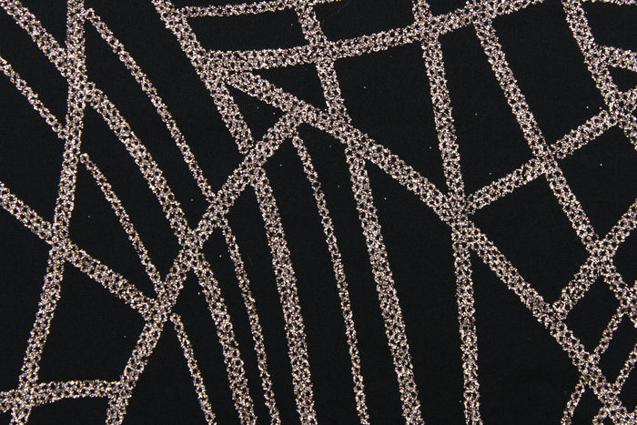 This 4 way stretch lycra blend fabric in black with rose gold sparkle accents is durable and breathable and will allow movements of the body. Uses include dance and sports wear, leotards and dresses.  We offer several different lycra fabrics.
