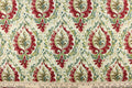 This fabric features a damask design in green, teal, cherry red, brown, beige, and cream.