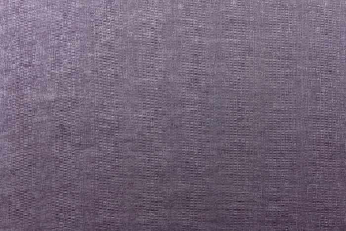 This taffeta fabric in iridescent in a gray purple.