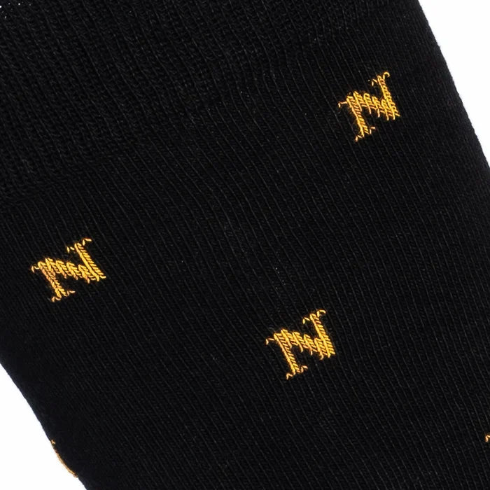 Napoleon ‘N’ allover black socks by Maison Broussaud