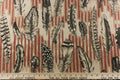 The cayenne color features a finely detailed feathers on a muted red stripe with black feathers on a tan background.