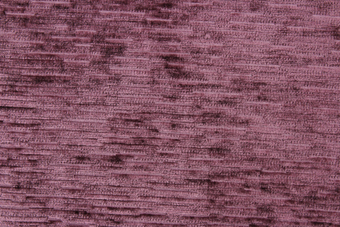 Driftwood is crafted from a luxurious chenille fabric with a ribbed texture in a stunning mulberry hue.  The soft, textured look adds an inviting touch to any room.  This high end upholstery weight fabric is suited for uses that requires a more hard wearing fabric.  It is great for upholstery projects including sofas, chairs, dining chairs, pillows, handbags and craft projects.