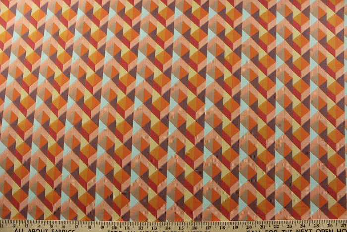 multipurpose tapestry fabric boasts a woven geometric design in shades of orange, purple, red, cream, and aqua. Crafted for durability with 51,000 double rubs, this fabric is perfect for a variety of projects.<span class="TextRun SCXW6698513 BCX8" lang="EN-US" data-contrast="auto" xml:lang="EN-US"><span class="NormalTextRun SCXW6698513 BCX8">&nbsp;</span></span>