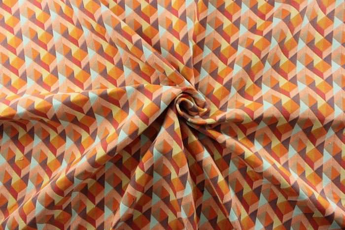 multipurpose tapestry fabric boasts a woven geometric design in shades of orange, purple, red, cream, and aqua. Crafted for durability with 51,000 double rubs, this fabric is perfect for a variety of projects.<span class="TextRun SCXW6698513 BCX8" lang="EN-US" data-contrast="auto" xml:lang="EN-US"><span class="NormalTextRun SCXW6698513 BCX8">&nbsp;</span></span>