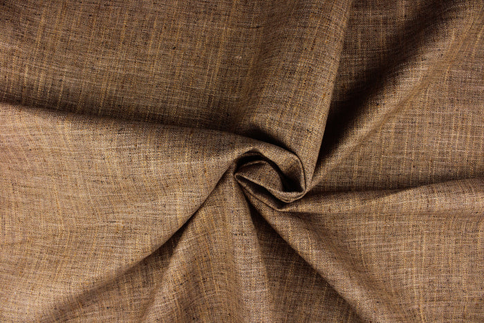 This fabric in brown offers beautiful design, style and color to any space in your home.  It is perfect for window treatments (draperies, valances, curtains, and swags), bed skirts, duvet covers, light upholstery, pillow shams and accent pillows.  It is stable and durable with a rating of 51,000 double rubs.
