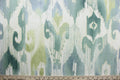 Lagrande is a multi use fabric featuring an ikat print design in blue, green and ivory.  The fabric is treated with a soil and stain repellant finish for lasting performance, rated for up to 15,000 double rubs.  The versatile fabric is perfect for window accents (draperies, valances, curtains and swags) cornice boards, accent pillows, bedding, headboards, cushions, ottomans, slipcovers and upholstery.