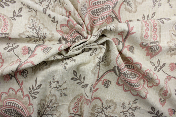 South Point features an intricate array of gray and coral flowers on a beige background.  The fabric is designed to be soil and stain repellant, with a durability rating of 15,000 double rubs.  The versatile fabric is perfect for window accents (draperies, valances, curtains and swags) cornice boards, accent pillows, bedding, headboards, cushions, ottomans, slipcovers and upholstery.