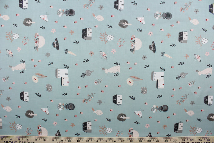 Happy Home is a whimsical house print featuring trees, flowers, rabbits, and hats in varying shades of pink, white, black, gray, and red against a soft green background.  Perfect for any living space, it is sure to bring a splash of joy to your home. The high-quality cotton material ensures lasting durability and softness. The versatile lightweight fabric is soft and easy to sew.  It would be great for apparel, quilting, crafting and sewing projects.