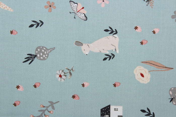 Happy Home is a whimsical house print featuring trees, flowers, rabbits, and hats in varying shades of pink, white, black, gray, and red against a soft green background.  Perfect for any living space, it is sure to bring a splash of joy to your home. The high-quality cotton material ensures lasting durability and softness. The versatile lightweight fabric is soft and easy to sew.  It would be great for apparel, quilting, crafting and sewing projects.