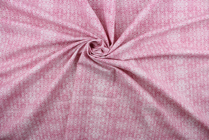 Sweetness features a timeless damask pattern in pink and white.  Perfect for any living space, it is sure to bring a splash of joy to your home. The high-quality cotton material ensures lasting durability and softness.  It would be great for apparel, quilting, crafting and sewing projects.