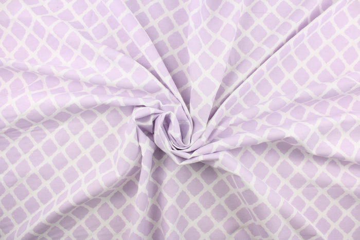 This printed flannel features a lattice design in white and lavendar.  Uses include apparel, bedding, pillows, home decor and crafting.  This fabric has a soft workable feel.