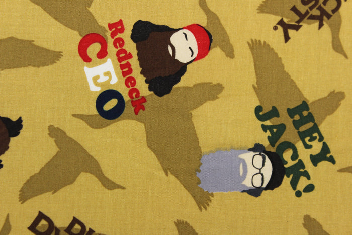 A duck dynasty character and saying design in brown, black, orange, green, gray, red, blue, tan and white .