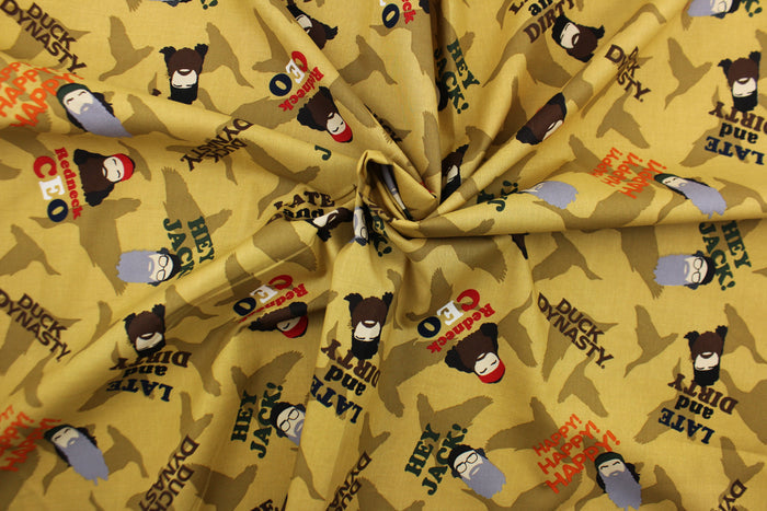 A duck dynasty character and saying design in brown, black, orange, green, gray, red, blue, tan and white .