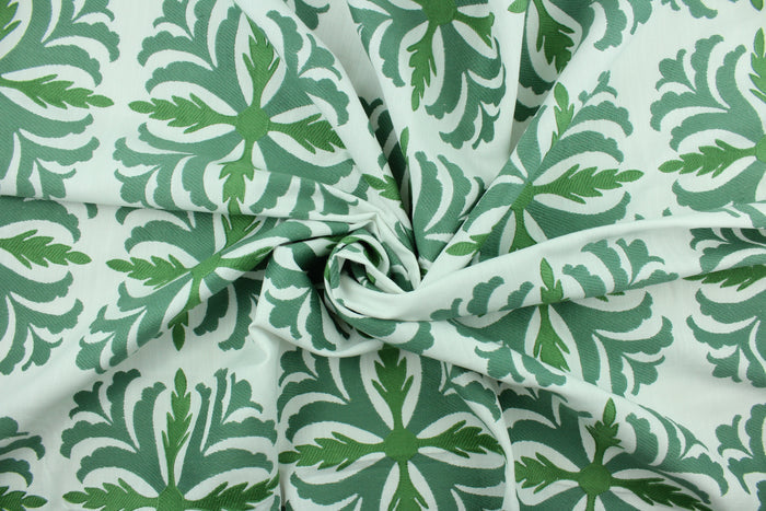 Joleen features a large leaf design in green on a white background.  Uses include drapery, pillows, light upholstery, table runners, bedding, headboards and home décor.