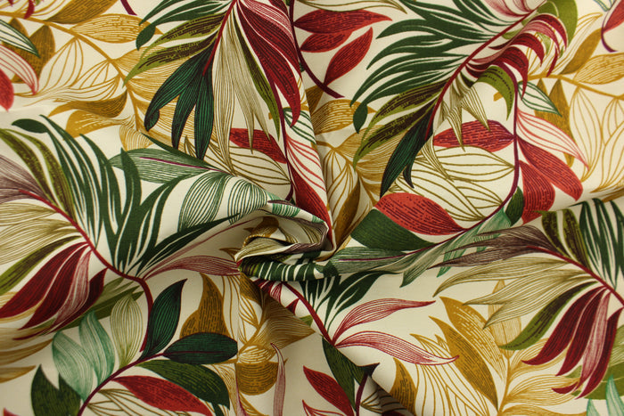 This Solarium outdoor decorative print features a large tropical leaf design in red, green and tan on a beige background.  This versatile, long-lasting fabric can withstand up to 500 hours of sunlight, water and stain resistant and has 10,000 double rubs.  It is perfect for lounge cushions, pool furniture, tablecloths, decorative pillows and upholstery projects.  This fabric has a slightly stiff feel but is easy to work with.