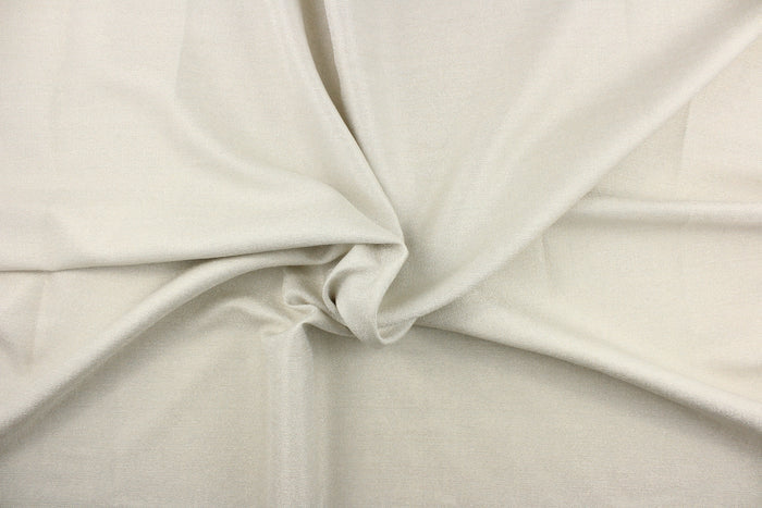 This textured semi sheer fabric in light linen has a slight shimmer and is perfect for curtains, swags, window scarfs and drapery panels.  We offer Mariposa in several different colors.
