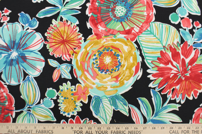This Solarium outdoor decorative print features a large floral design in the colors of red, dark yellow, blue, white and green on a black background.  This versatile, long-lasting fabric can withstand up to 500 hours of sunlight, water and stain resistant and has 10,000 double rubs.  It is perfect for lounge cushions, pool furniture, tablecloths, decorative pillows and upholstery projects.  This fabric has a slightly stiff feel but is easy to work with.