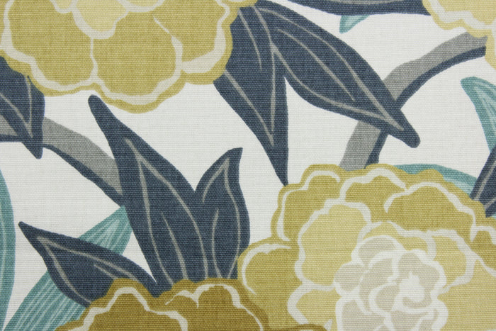 The Robert Allen© Peony Vine in Dew is the perfect multi-use fabric for any project.  Beautiful peony vine detailing in jade, seafoam green, steel blue, gray, tan, and yellow on an off white background.  Boasting 100,000 double rubs this fabric is durable.  It can be used for several different statement projects including window accents (drapery, curtains and swags), toss pillows, headboards, bed skirts, duvet covers and upholstery.