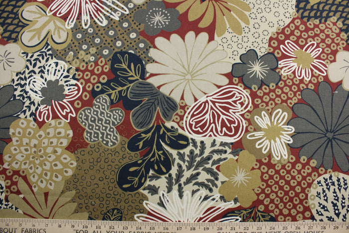 Robert Allen© Zomper in Henna is a beautiful large floral print fabric featuring rust, shades of tan, dark navy blue, white, and gray. The soil and stain repellent finish make it suitable for any environment, and its durability rating of 100,000 double rubs ensures it will withstand the test of time.  It can be used for several different statement projects including window accents (drapery, curtains and swags), toss pillows, headboards, bed skirts, duvet covers and upholstery.