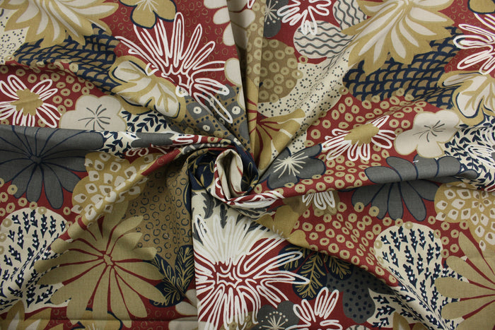 Robert Allen© Zomper in Henna is a beautiful large floral print fabric featuring rust, shades of tan, dark navy blue, white, and gray. The soil and stain repellent finish make it suitable for any environment, and its durability rating of 100,000 double rubs ensures it will withstand the test of time.  It can be used for several different statement projects including window accents (drapery, curtains and swags), toss pillows, headboards, bed skirts, duvet covers and upholstery.