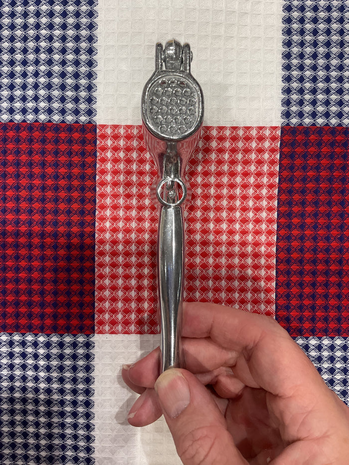 Roger Orfèvre 2-in-1 garlic crusher and olive/cherry pitter
