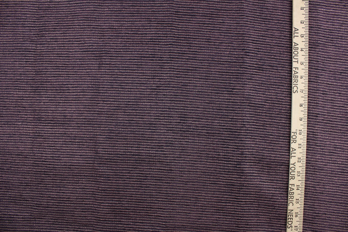 This duotone hard wearing, textured chenille fabric in purple would be a beautiful accent to your home decor.  It is water and stain resistant and would be great for high traffic areas.  Uses include upholstery, pillows, table runners handbags, etc.