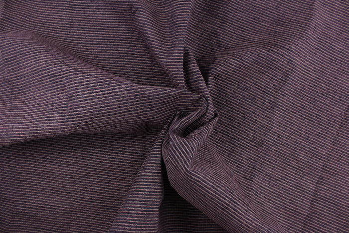 This duotone hard wearing, textured chenille fabric in purple would be a beautiful accent to your home decor.  It is water and stain resistant and would be great for high traffic areas.  Uses include upholstery, pillows, table runners handbags, etc.