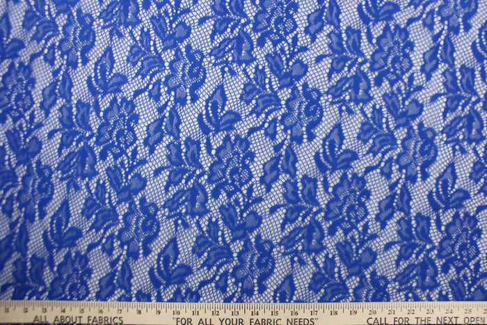 This lace features a floral design in a rich royal blue with a stretch.