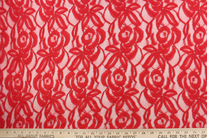 This lace features a floral design in a beautiful red tone  with a stretch.