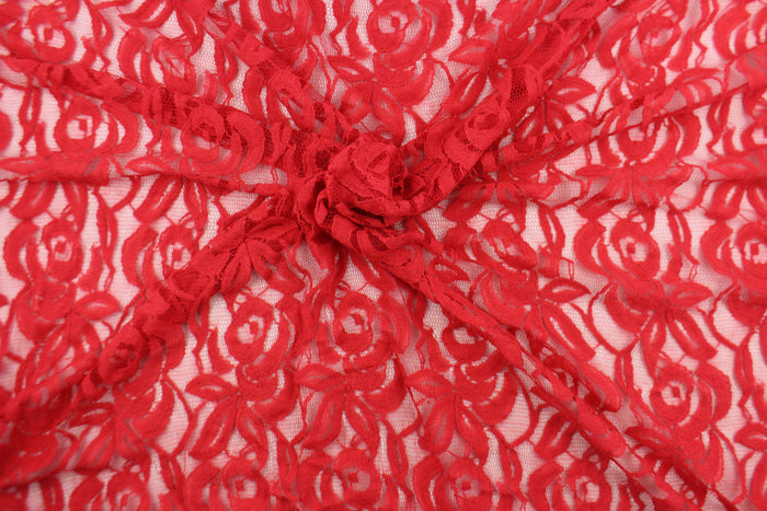 This lace features a floral design in a beautiful red tone  with a stretch.