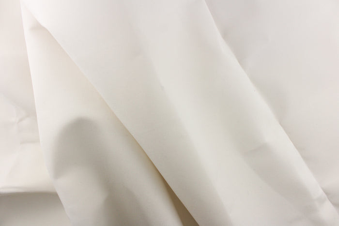 This fabric in  a solid white is great for umbrellas, outdoor upholstery and more.