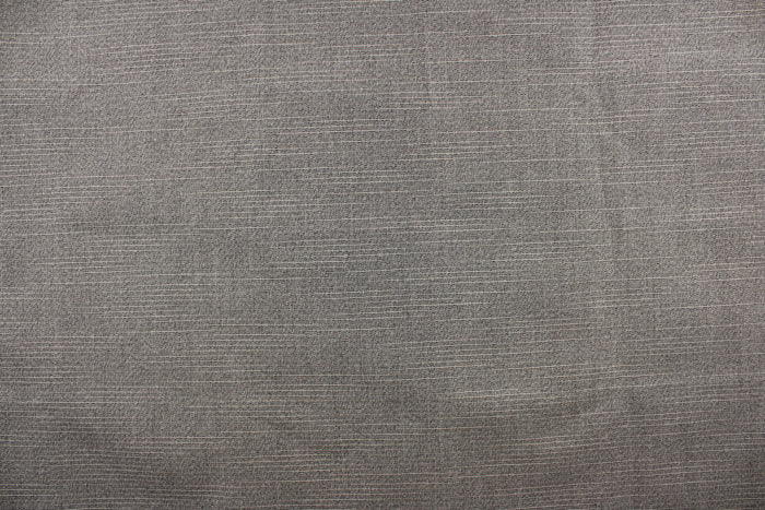 A grayish brown fabric great for umbrellas, outdoor upholstery and more.