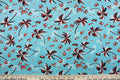 This fabric has a tropical theme featuring palm trees, fish and fruit in red, black and white against a light blue background.  It is durable and breathable and will allow movements of the body.  Uses include dance and sports wear, leotards and dresses.  We offer several different lycra fabrics.